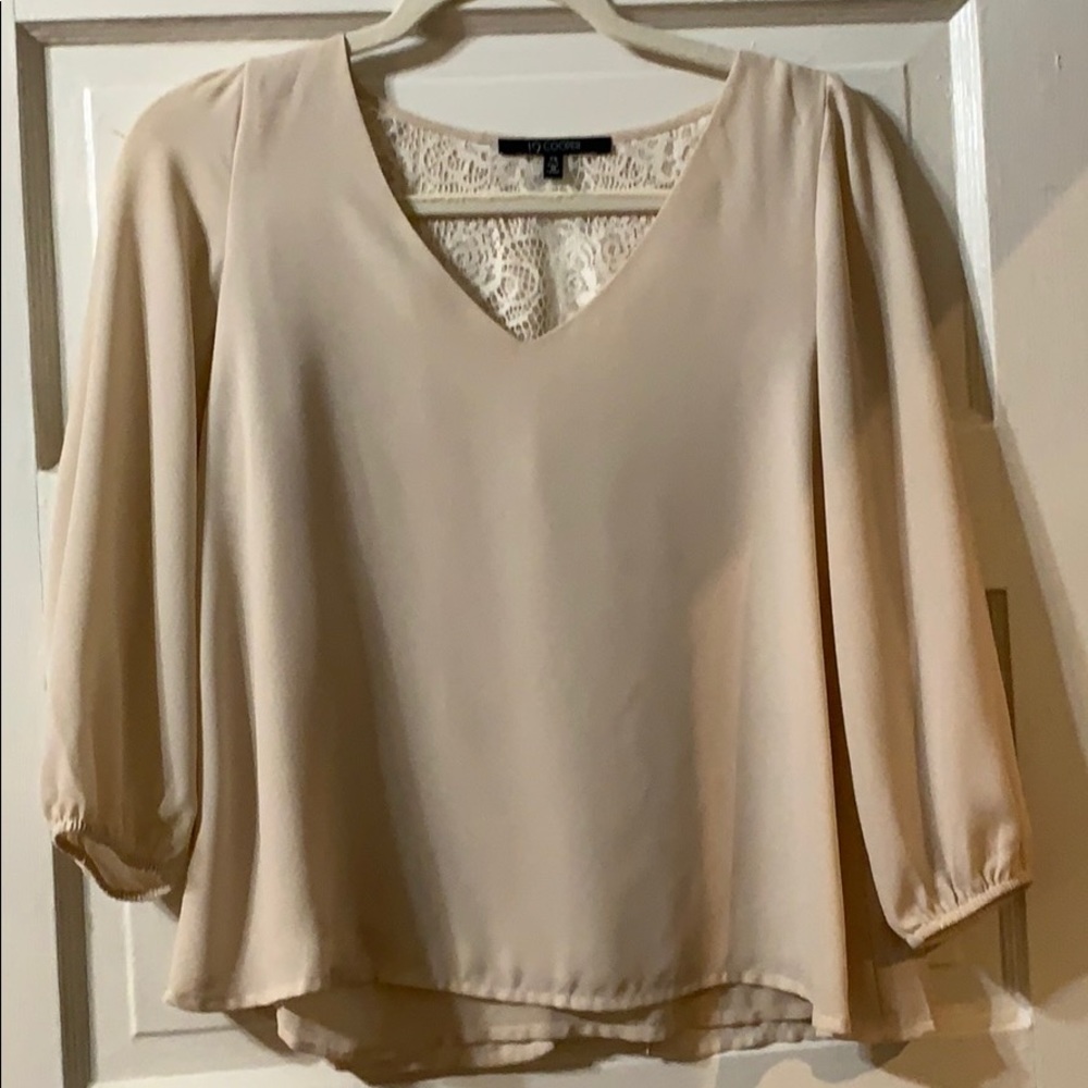 Cream blouse with partial lace back